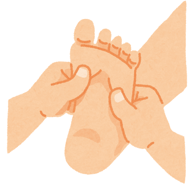 足のツボをもむ